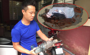 Nhân chứng kể phút đục tường cứu bé trai sơ sinh bị vứt trong khe hẹp 