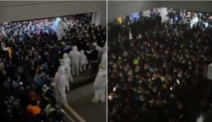 Video: 'Lùa' trăm người vào hầm xét nghiệm COVID-19, sân bay Trung Quốc vỡ trận