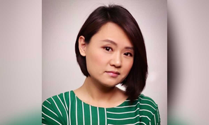 Trung Quốc bắt giữ nhân viên hãng tin Mỹ