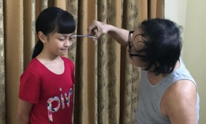 Ảnh: Cuộc sống thiếu bóng dáng phụ nữ của nghệ sĩ Giang Còi 