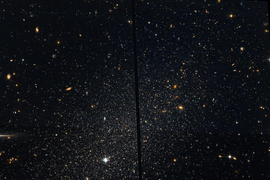 Thiên hà 'làm thịt' đồng loại, đá văng các sao của nạn nhân ra vùng 'ngoại ô'