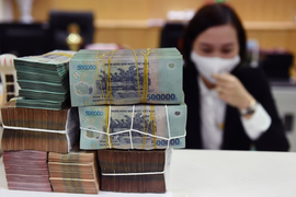 COVID-19 bùng phát, ngân hàng mạnh tay cắt giảm nhân sự 