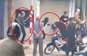 Công an điều tra nhóm người vác hung khí tấn công cô gái trẻ trên phố Hà Nội