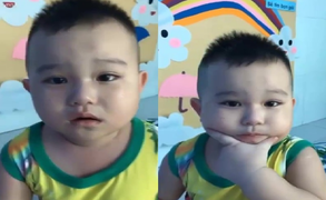Clip: Đang khóc nhè, bé trai vội lau nước mắt để chụp ảnh