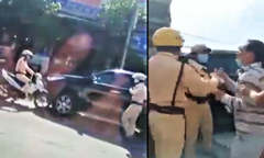 Tài xế cho ô tô chạy lùi như bay trên quốc lộ, chống đối cảnh sát giao thông