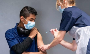 Sống chung với COVID-19 không giống cúm mùa