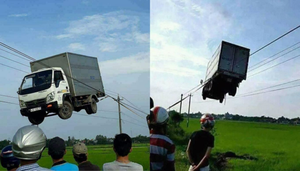 Chiếc xe tải 'diễn xiếc' trên đường dây điện mỏng manh gây kinh ngạc