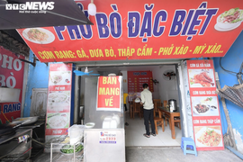 Hà Nội cho phép dịch vụ ăn, uống được bán mang về tại một số địa bàn 'vùng xanh'