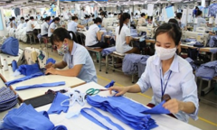 Lợi nhuận doanh nghiệp dệt may trồi sụt vì COVID-19