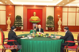 Hình ảnh Tổng Bí thư dự cuộc gặp cấp cao Việt Nam-Campuchia-Lào