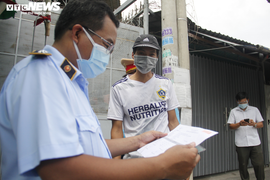 TP.HCM bỏ giấy đi đường, người tiêm vaccine, F0 khỏi bệnh được ra đường