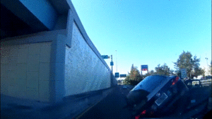 Video: Xe hơi vượt ẩu, lật ngửa trên đường