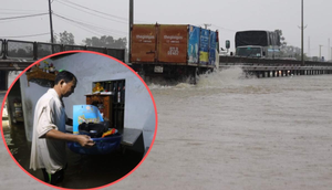 Ảnh: Quốc lộ 1A ngập sâu, người dân Quảng Nam hối hả thu dọn đồ đạc