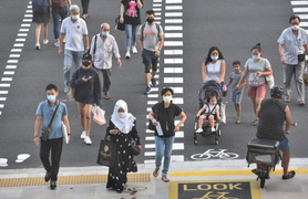 Sống chung với COVID-19, Singapore tăng sốc ca bệnh 