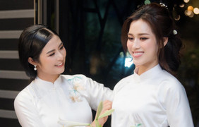 Đỗ Thị Hà đẹp mong manh với áo dài trắng, diễn thời trang cùng đàn chị Ngọc Hân