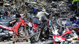 Cháy hơn 140 xe máy tại bãi giữ xe vi phạm pháp luật ở Bình Dương