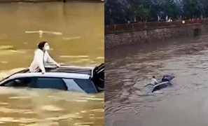 Đau lòng cô gái chết đuối trên ô tô dù hàng trăm người tìm cách cứu hộ