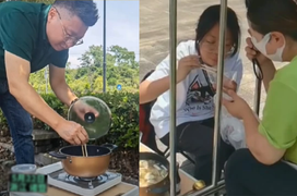Bố lặn lội 200km đến trường nấu ăn ngay tại cổng cho con ăn vì 1 cú điện thoại
