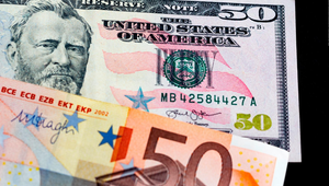 Đồng euro lần đầu ngang giá USD sau 20 năm