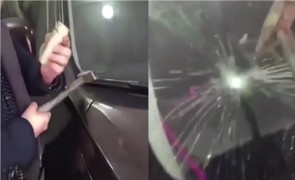 Chết lặng khi khách hàng dùng búa thử kính ô tô