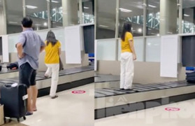 Cục Hàng không sẽ xử lý nghiêm khách nữ đứng lên băng chuyển hành lý sân bay