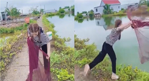 Lỡ trớn khi quăng chài, người đẹp lao tòm xuống nước
