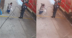 Lính cứu hỏa bật cười với pha xử lý 'cồng kềnh' của cô gái đi đường