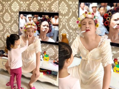 Bố bất lực khi con gái bắt mặc váy, trang điểm thành bà cô