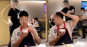 Nhân viên nhà hàng làm bay cả tóc giả của khách