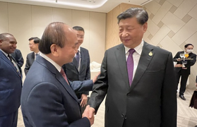 Chủ tịch nước Nguyễn Xuân Phúc gặp Tổng Bí thư, Chủ tịch Trung Quốc Tập Cận Bình