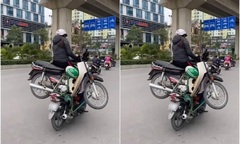 CSGT Hà Nội mời chủ xe trong clip hai xe 'làm xiếc' trên phố tới làm việc