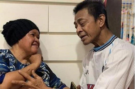 Người đàn ông khập khiễng lao vào căn hộ đang cháy để cứu vợ và con mèo