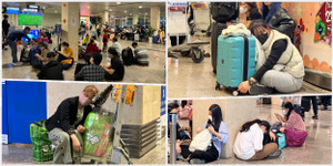 Hành khách vạ vật ở sân bay Tân Sơn Nhất đợi chuyến bay về quê đón Tết