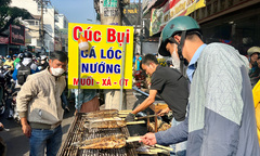 TP.HCM: Chen chân mua cá lóc nướng, nhiều người phải 'vào bếp' để giữ cá đã chọn