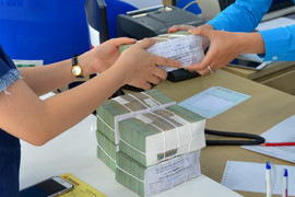 NHNN sẽ xử lý nghiêm các ngân hàng ép khách mua bảo hiểm