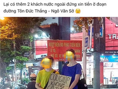 Hai người nước ngoài đứng trên đường phố Đà Nẵng xin 'cứu giúp'