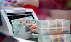 NHNN cấm các ngân hàng dùng chiêu lách trần lãi suất tiết kiệm