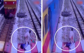 Thót tim cảnh cụ bà bị điếc thoát chết khi đi qua đường ray tàu hoả