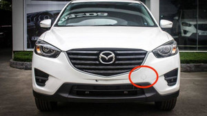 Nắp tròn trên cản ô tô có tác dụng gì?