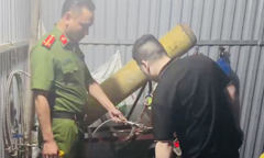 Phát hiện điểm san chiết bóng cười ngụy trang trong khu vực bãi xe ở Hà Nội