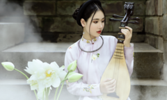 Mẫu nhí Minh Anh đẹp mơ màng trong tà áo dài truyền thống
