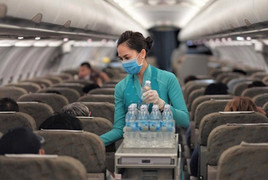 Những thời điểm trong chuyến bay không nên gọi tiếp viên