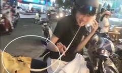 Dân mạng cười sặc khi xem cô gái ăn bánh đồng xu mà như chơi nhảy dây 