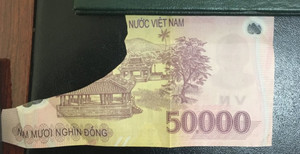 Tiền bị rách góc thì có được lưu thông?