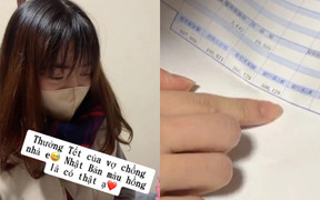Clip bóc phong bì thưởng Tết 185 triệu đồng của cặp vợ chồng trẻ gây sốt mạng