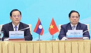 Thủ tướng hai nước Việt Nam - Lào chủ trì Hội nghị hợp tác đầu tư Việt - Lào