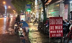 Sử dụng hè phố để rửa xe bị xử phạt thế nào?