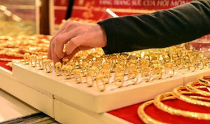 Vì sao có tục mua vàng ngày vía Thần Tài?
