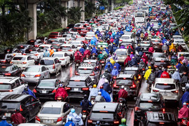 Sáng nay, cả thành phố đi làm muộn