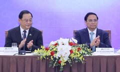 Thủ tướng Việt Nam và Lào chủ trì tọa đàm với doanh nghiệp ASEAN và các đối tác